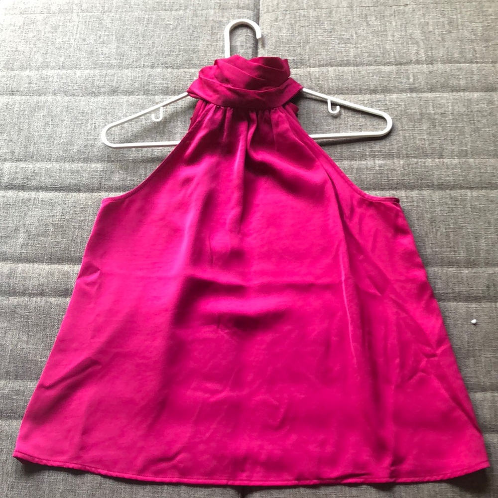 Magenta cold shoulder high neck top.Size medium ties at the neck in the back.